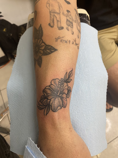 Explore tattoo ideas for men chest, creative tattoo ideas in Honolulu, available at Sacred Art Tattoo Waikiki