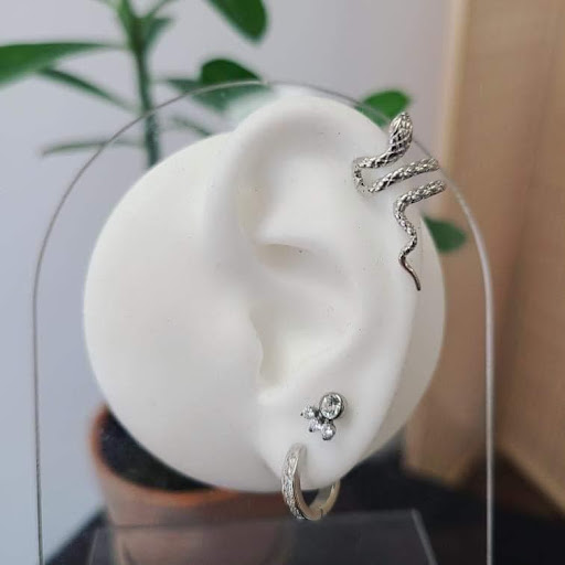 Explore happiness tattoo ideas, creative tattoo ideas in Nacogdoches, available at Primal Piercing & Jewelry