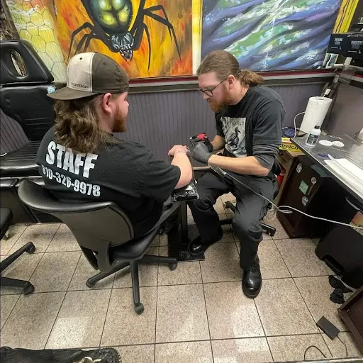 Explore cycling tattoo ideas, creative tattoo ideas in Pottstown, available at Beneath The Skin Tattoo