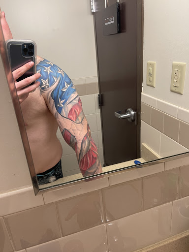 Explore thigh tattoo ideas for men, creative tattoo ideas in Alexandria, available at Inked Up Tattoo in MacArthur
