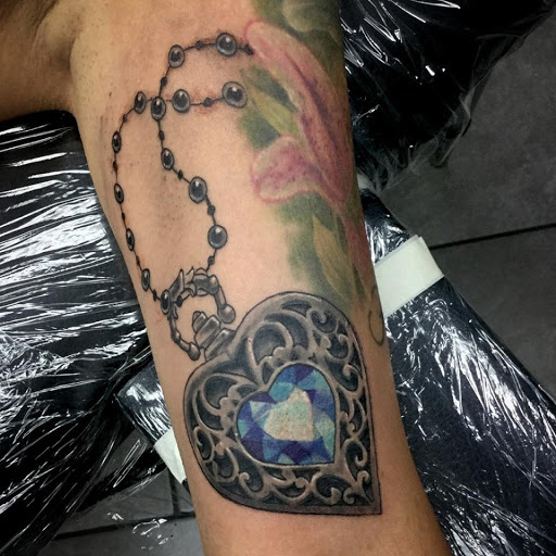 Explore forearm arrow tattoo ideas, creative tattoo ideas in Edgewood, available at Evolved Body Arts