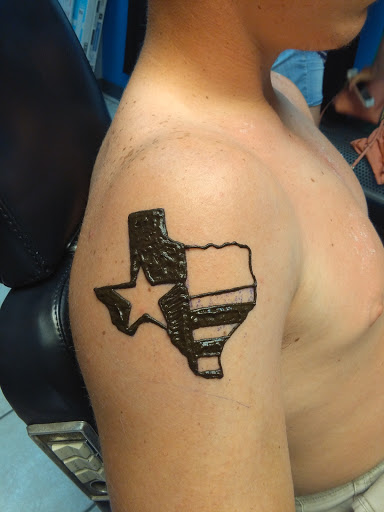 Explore women's leg tattoo ideas, creative tattoo ideas in Bradenton, available at Memory Lane Tattoo Co.