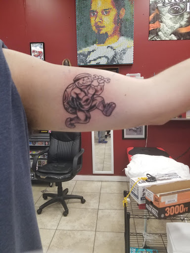 Explore sheet music tattoo ideas, creative tattoo ideas in Katy, available at Artistic Impressions Tattoo Studio