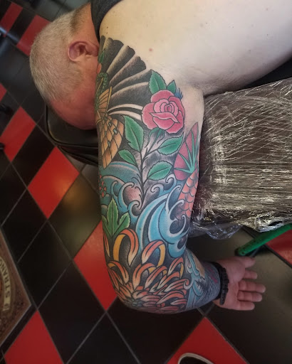 Explore michael name tattoo ideas, creative tattoo ideas in Milwaukee, available at Atomic Tattoos