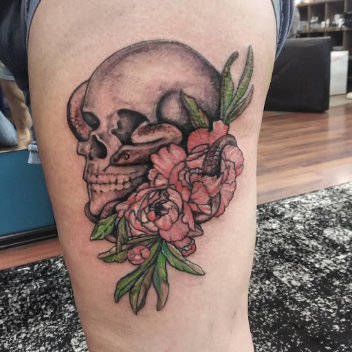 Find music symbol tattoo ideas for your next unique tattoo in Colorado Springs at Skin Evolution Tattoo