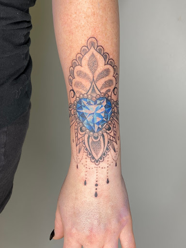 Explore neck tattoo ideas, creative tattoo ideas in Loganville, available at Blue Siren Tattoos