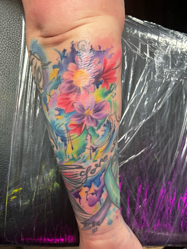 Explore women thigh tattoo ideas, creative tattoo ideas in Jefferson, available at Slammin Ink Tattoo