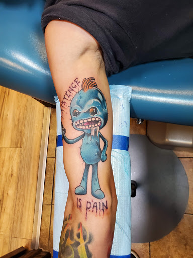 Explore cool back tattoo ideas, creative tattoo ideas in Oshkosh, available at Big Guns Tattoo Oshkosh