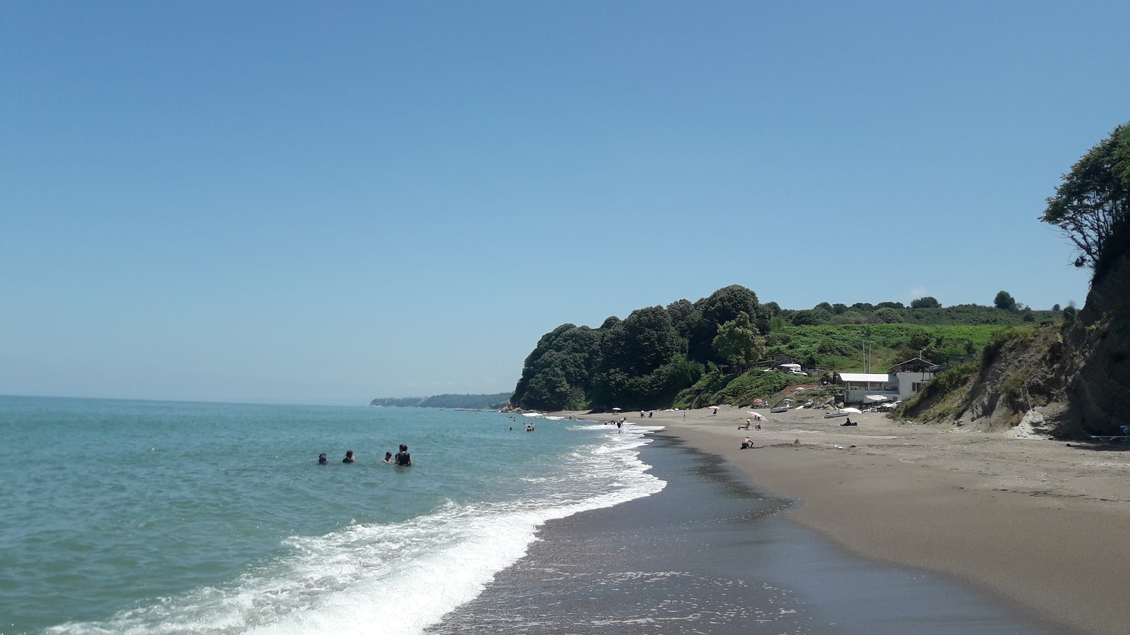 Pasalar plaji的照片 带有碧绿色水表面
