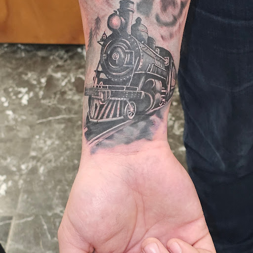 Explore big flower tattoo ideas, creative tattoo ideas in Clinton, available at House of 1000 Needles