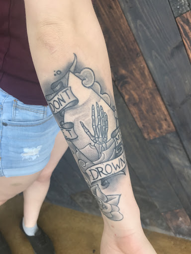 Explore barbed wire tattoo cover up ideas, creative tattoo ideas in Mcallen, available at The Ink Elephant