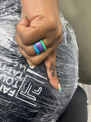 Explore flower leg tattoo ideas, creative tattoo ideas in Mattapan, available at Famous Touch Tattoos