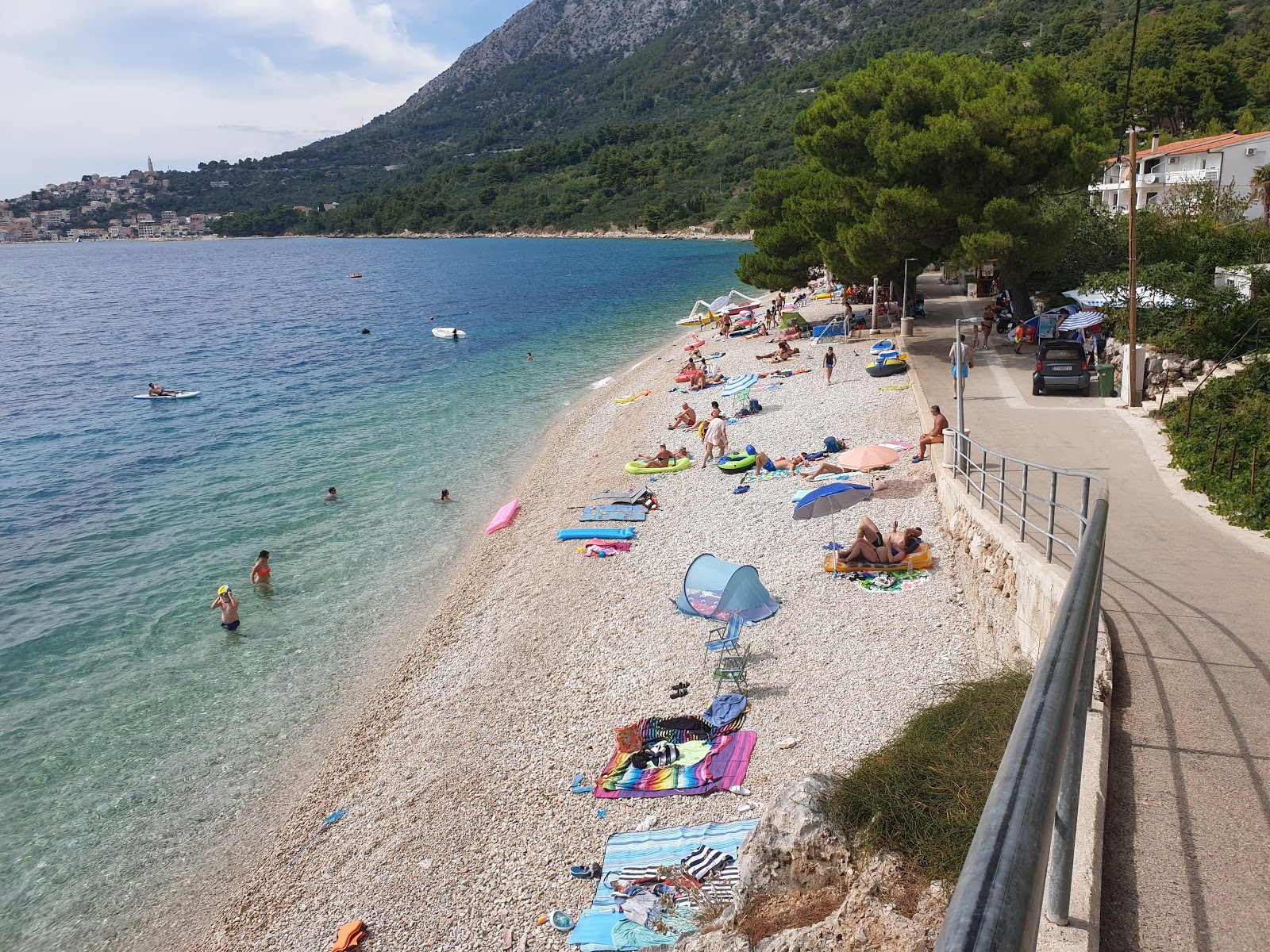 Foto di Porat beach con una superficie del ciottolo leggero