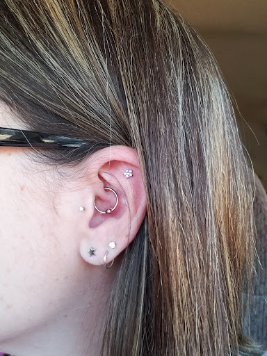 Find feminine skull tattoos ideas for your next unique tattoo in Oklahoma City at 23rd Street Body Piercing since 1995