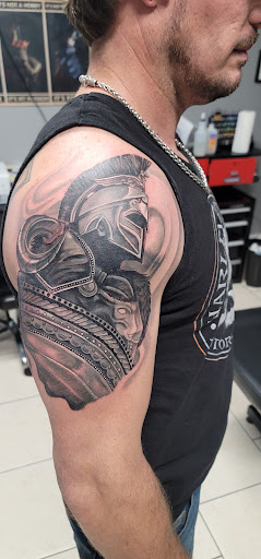 Explore vienna tattoo ideas, creative tattoo ideas in Ocoee, available at Slaughterized Ink Tattoo and Piercing Studio