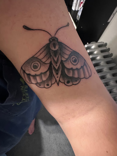 Explore weightlifting tattoo ideas, creative tattoo ideas in Orwigsburg, available at Small World Tattoo