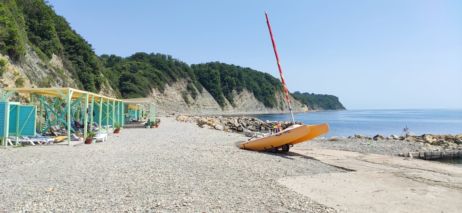 Fotografija Aidar Village beach z sivi kamenček površino