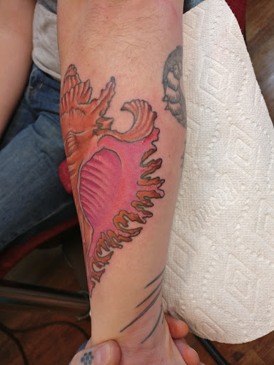 Explore above knee tattoo ideas, creative tattoo ideas in Eagle River, available at Eagle River Tattoo