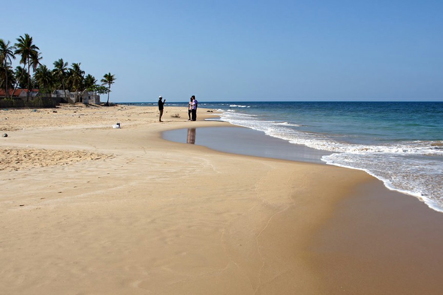 Foto von Moorkkam Beach und die siedlung