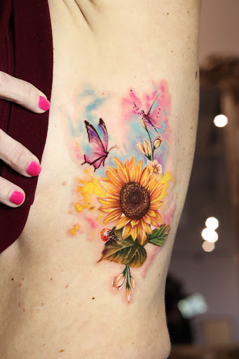 Explore cross tattoo sleeve ideas, creative tattoo ideas in Montgomery, available at Flying Eye Tattoo Studio