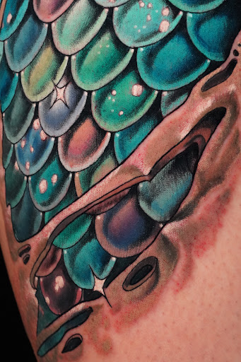 Explore above the knee tattoo ideas, creative tattoo ideas in New York, available at Red Baron Ink Tattoo and Piercing
