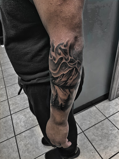 Explore december birth tattoo ideas, creative tattoo ideas in Lavonia, available at 1890 Tattoo Co.