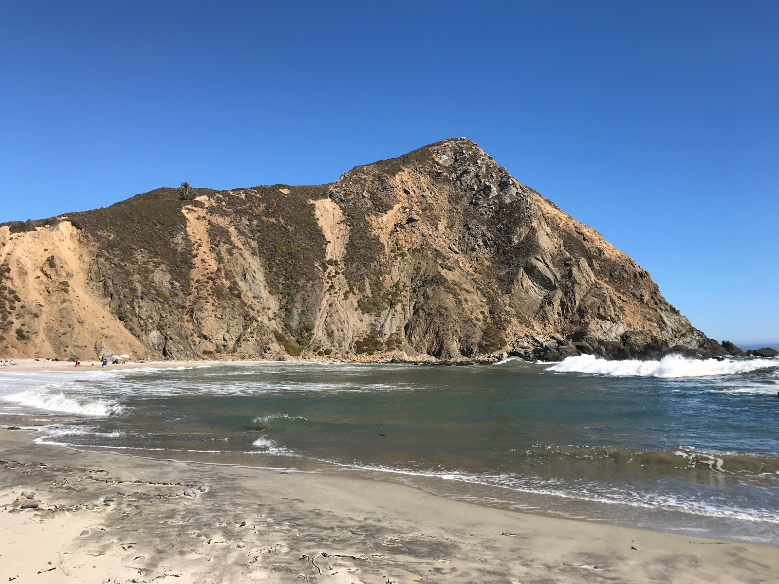 Foto von Pfeiffer Beach mit mittlere buchten