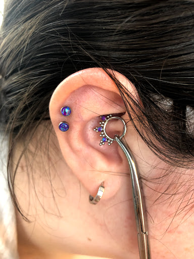 Explore full moon tattoo ideas, creative tattoo ideas in Bloomington, available at Evil by the Needle Custom Tattoo and Piercing Studio