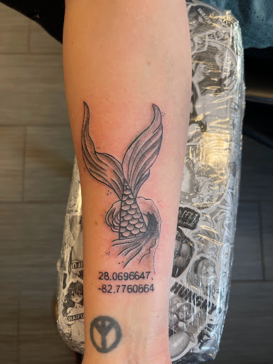 Explore opossum tattoo ideas, creative tattoo ideas in Palm Harbor, available at Angry Owl Tattoo and Piercing