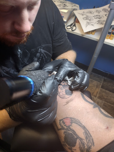 Explore small wrist tattoo cover up ideas, creative tattoo ideas in Birmingham, available at Heavily Tatted