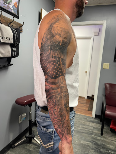 Explore hand mens tattoo ideas, creative tattoo ideas in Des Moines, available at Skin Kitchen Tattoo