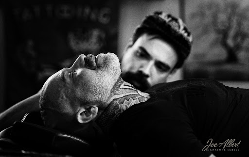 Explore outer thigh tattoo ideas, creative tattoo ideas in Canton, available at The Inkeepers Tattoo Parlor