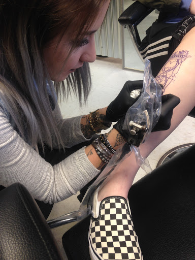 Explore sunshine tattoo ideas, creative tattoo ideas in Kent, available at War Horse Ink