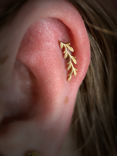 Explore under chin tattoo ideas, creative tattoo ideas in Las Vegas, available at Club Tattoo