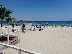Foto von Murrotto Beach und die siedlung