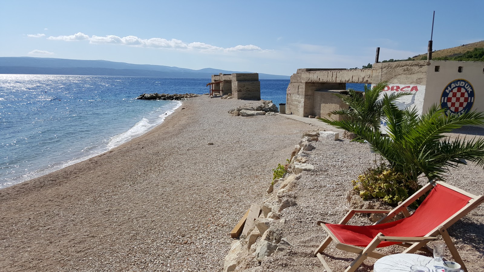 Zicova Riva beach'in fotoğrafı - rahatlamayı sevenler arasında popüler bir yer