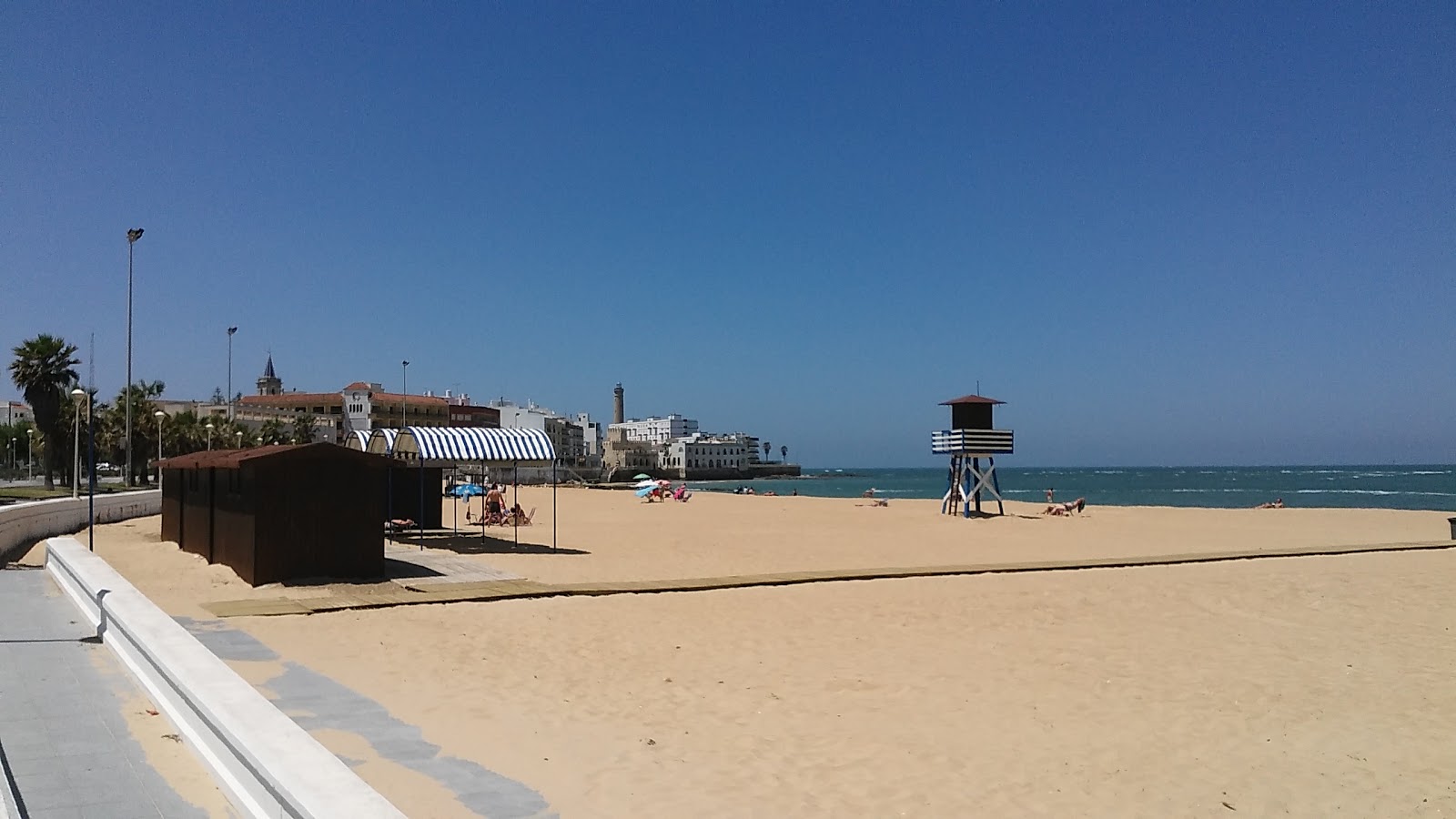 Playa Cruz del Mar'in fotoğrafı geniş plaj ile birlikte