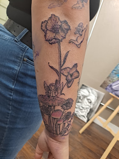 Explore tattoo ideas on ribs, creative tattoo ideas in Roanoke, available at Saint Cecilias Art Studio