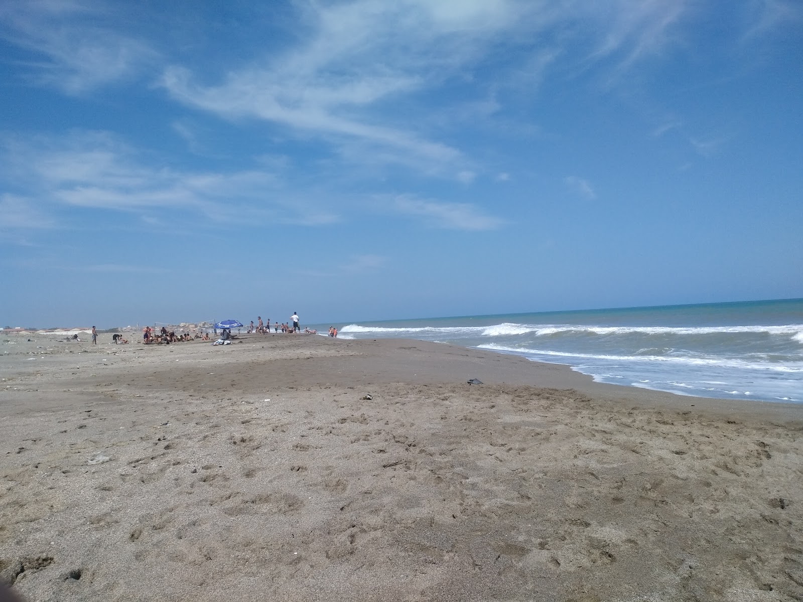 Foto av Plage Adim med lång rak strand