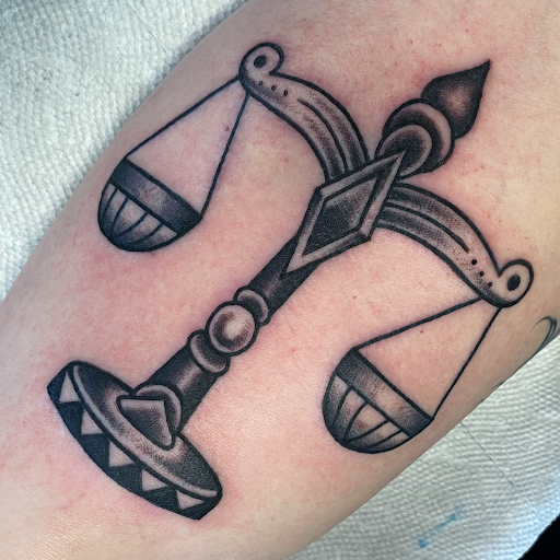 Explore saturn tattoo ideas, creative tattoo ideas in Raleigh, available at Raleigh Tattoo Company