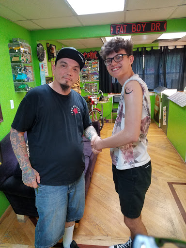 Tattoo Shop «Fat Brothers Productions», reviews and photos, 2953 E Highland Rd, Highland Charter Twp, MI 48356, USA
