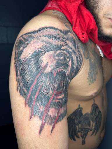 Explore haunted mansion tattoo ideas, creative tattoo ideas in Dayton, available at Uppity Tattoos