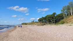 Foto von 57 parallels beach mit langer gerader strand