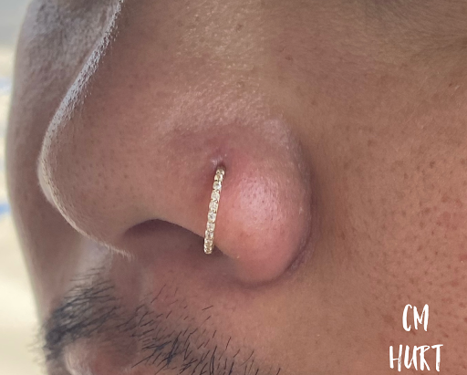 Explore reading tattoo ideas, creative tattoo ideas in Garden Grove, available at CM Hurt Piercing & Jewelry