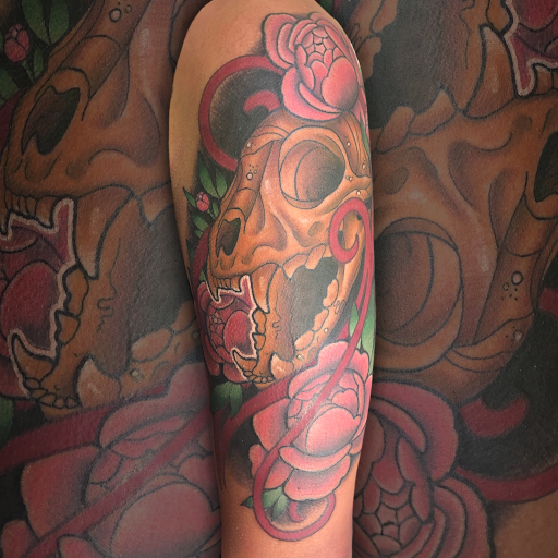 Explore grinch tattoo ideas, creative tattoo ideas in Prescott, available at BlackGold Tattoo