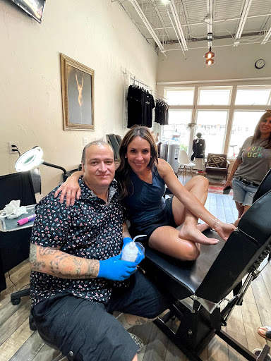 Explore catfish tattoo ideas, creative tattoo ideas in Avon, available at Avanti Tattoo