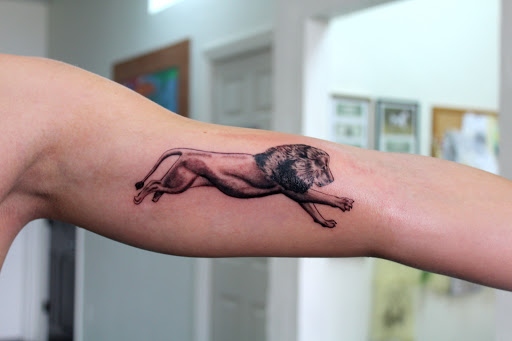 Explore cat and dog tattoo ideas, creative tattoo ideas in Fort Myers, available at Tiger Lotus Tattoo and Piercing