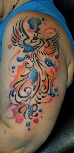 Explore deceased dog tattoo ideas, creative tattoo ideas in Angola, available at Hoodlum Ink