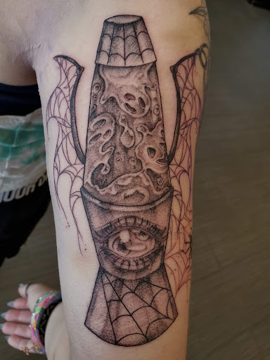 Explore evil eye tattoo ideas, creative tattoo ideas in Palm Harbor, available at Angry Owl Tattoo and Piercing