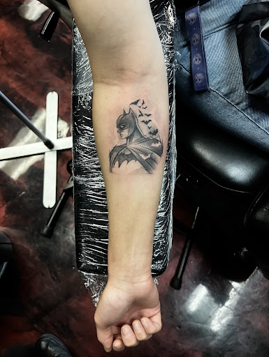 Explore tramp stamp tattoo cover up ideas, creative tattoo ideas in Silver City, available at Independent Ink Tattoo